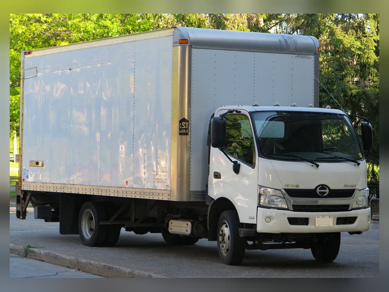 White Hino box truck used for local delivery
